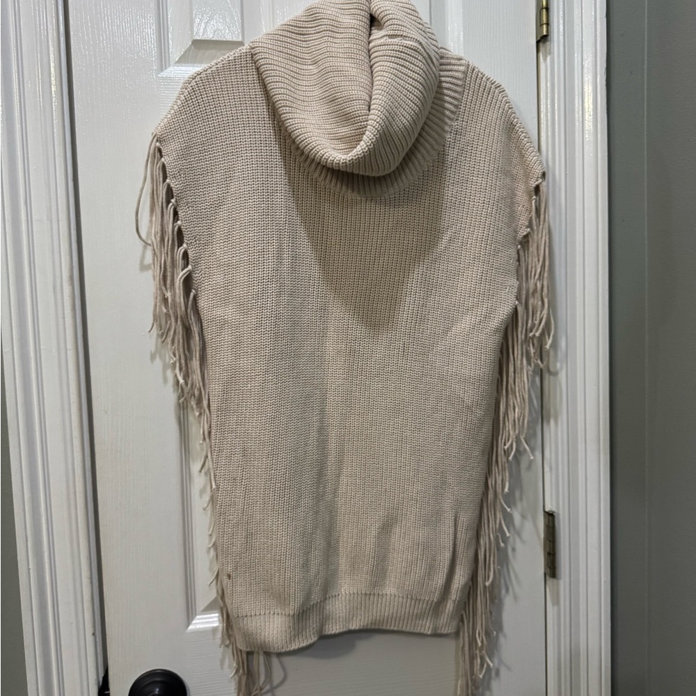 Elegant Cream Turtleneck Sweater with Fringe